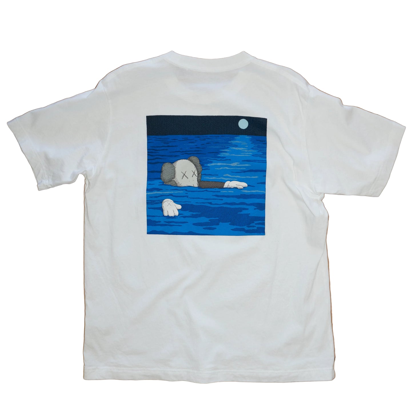 KAWS + Uniqlo UT "Tide Artbook Cover" (De Uso)