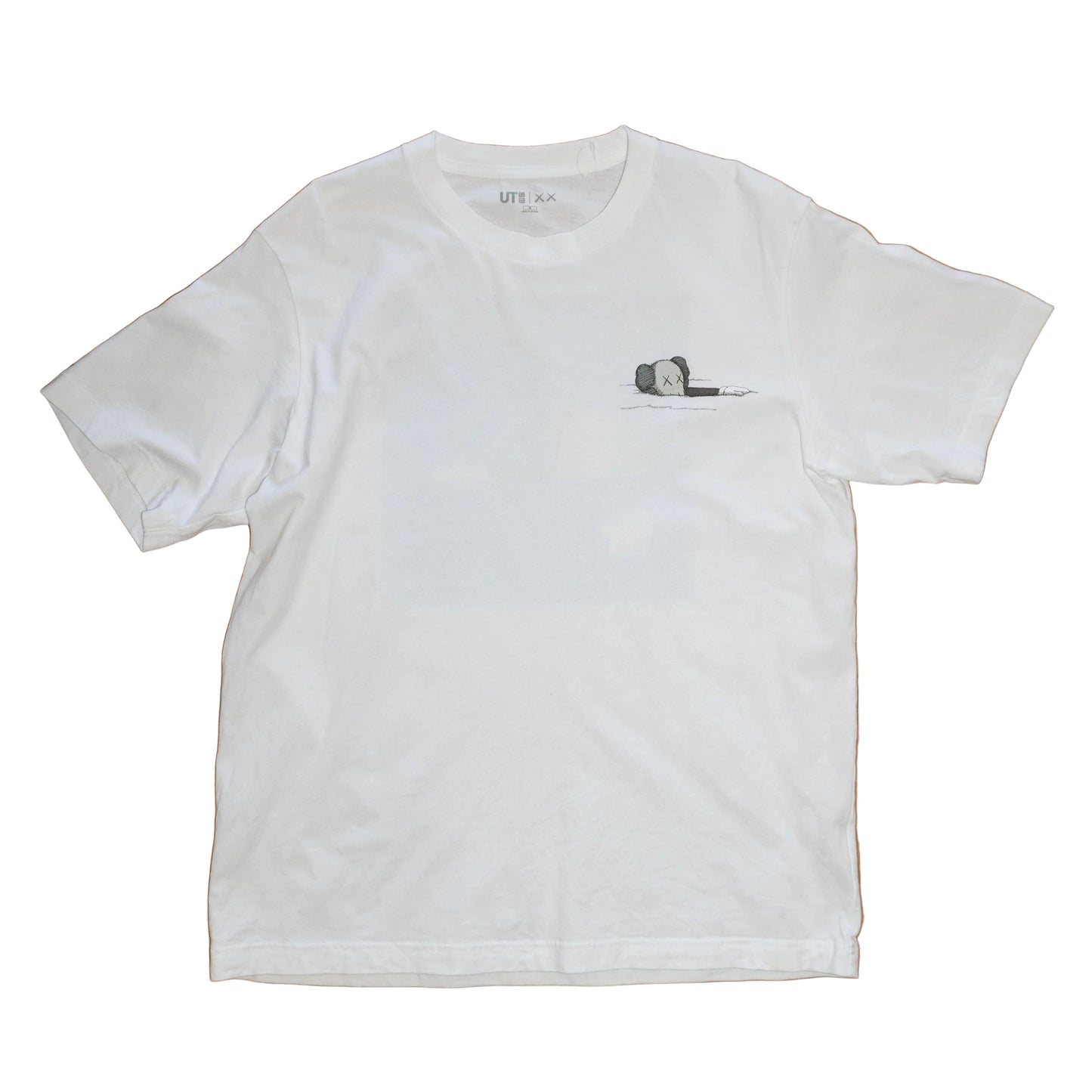 KAWS + Uniqlo UT "Tide Artbook Cover" (De Uso)